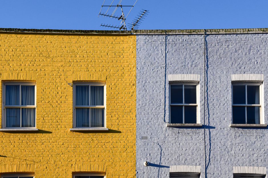 Painted house wall in bright daylight